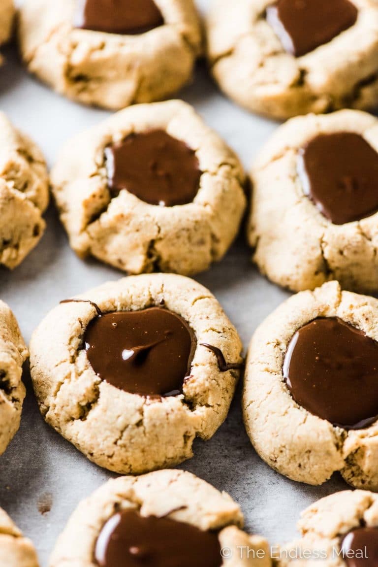 Chocolate Almond Thumbprint Cookies on a tray.