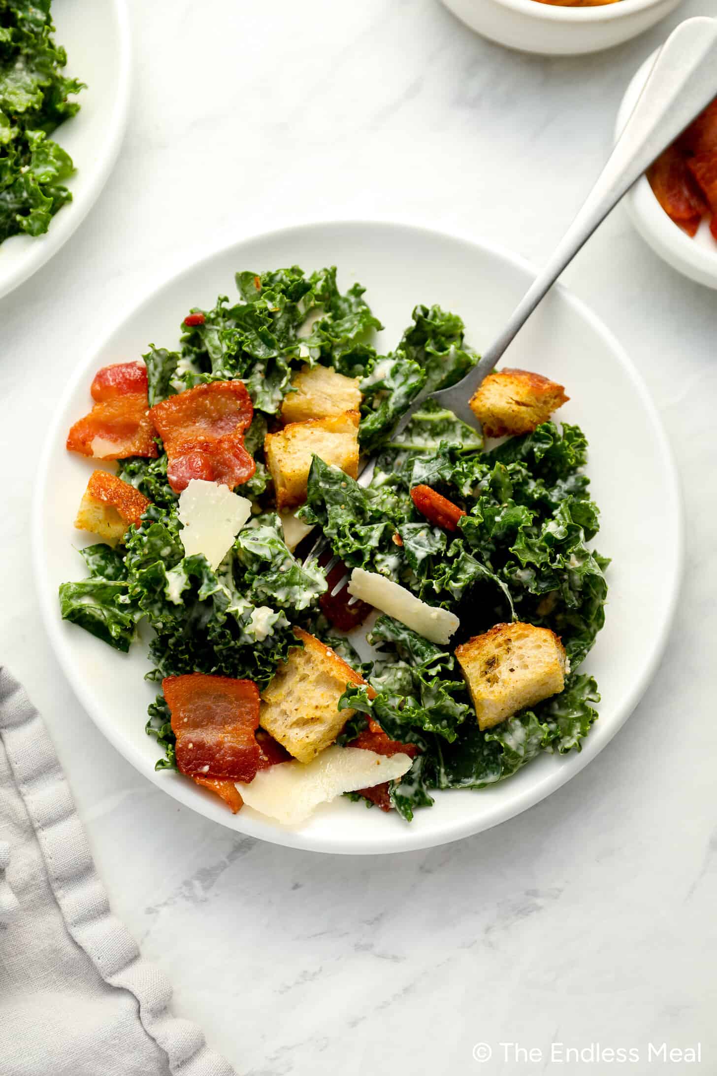 Kale Caesar Salad on a dinner plate