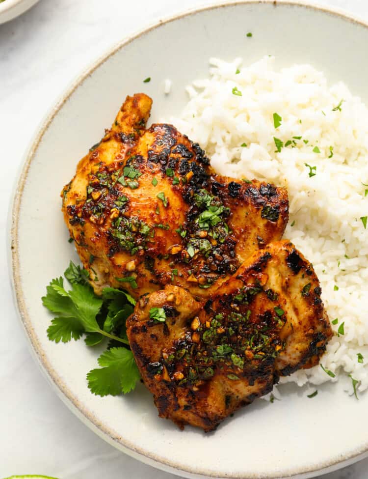 Cilantro Lime Chicken on a dinner plate with rice