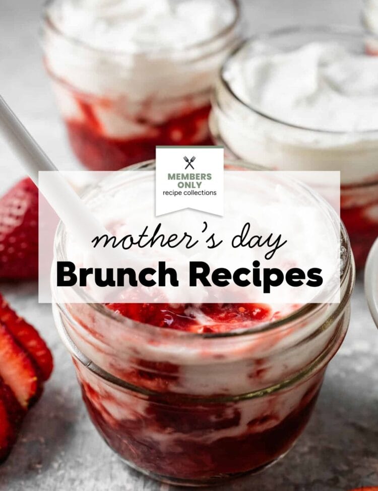 Three glass jars filled with layers of strawberry sauce and whipped cream, with a spoon in one jar. Text overlay reads: Mother’s Day Brunch Recipes—perfect for celebrating Mom with a sweet homemade treat.
