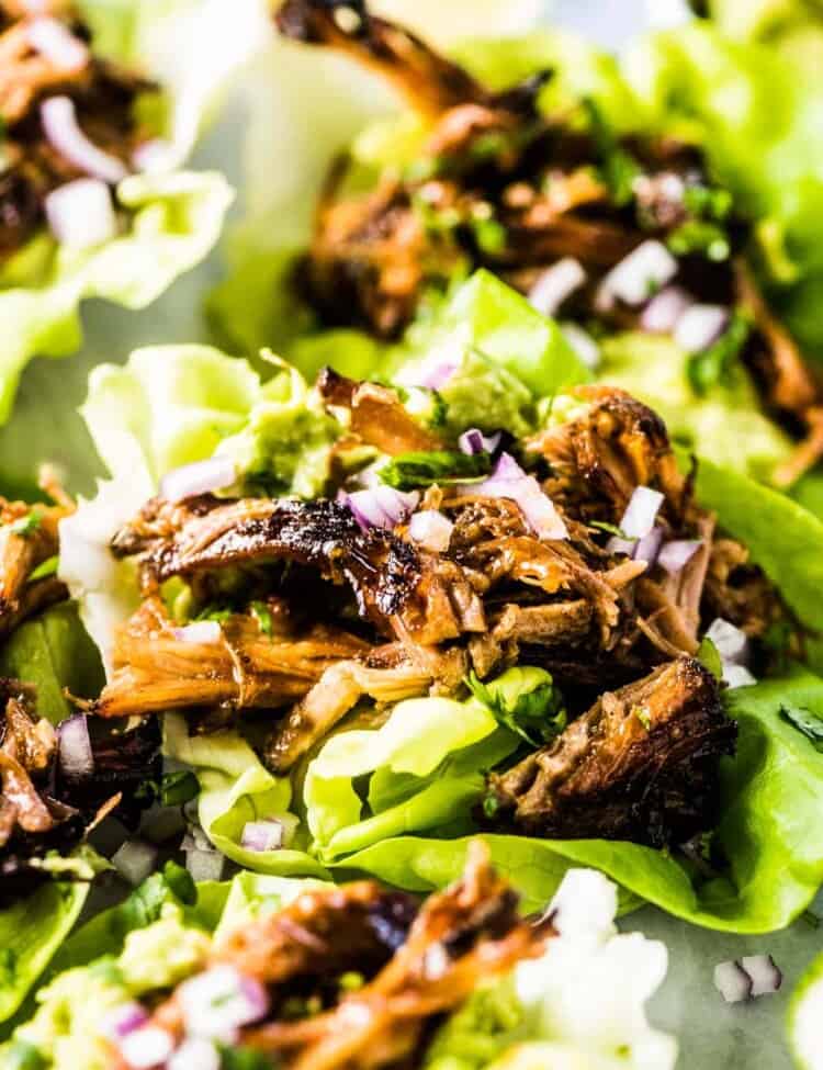 Taco Lettuce Wraps filled with the most delicious pulled pork carnitas.