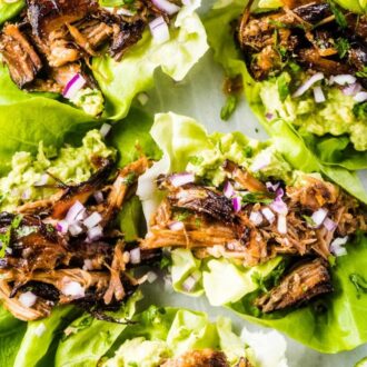 Pork lettuce wraps that are filled with the most delicious Mexican pulled pork.