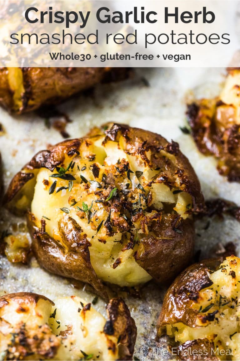 Pinterest image of crispy smashed red potatoes with the title on the picture. 