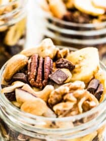 Homemade trail mix in glass jars.