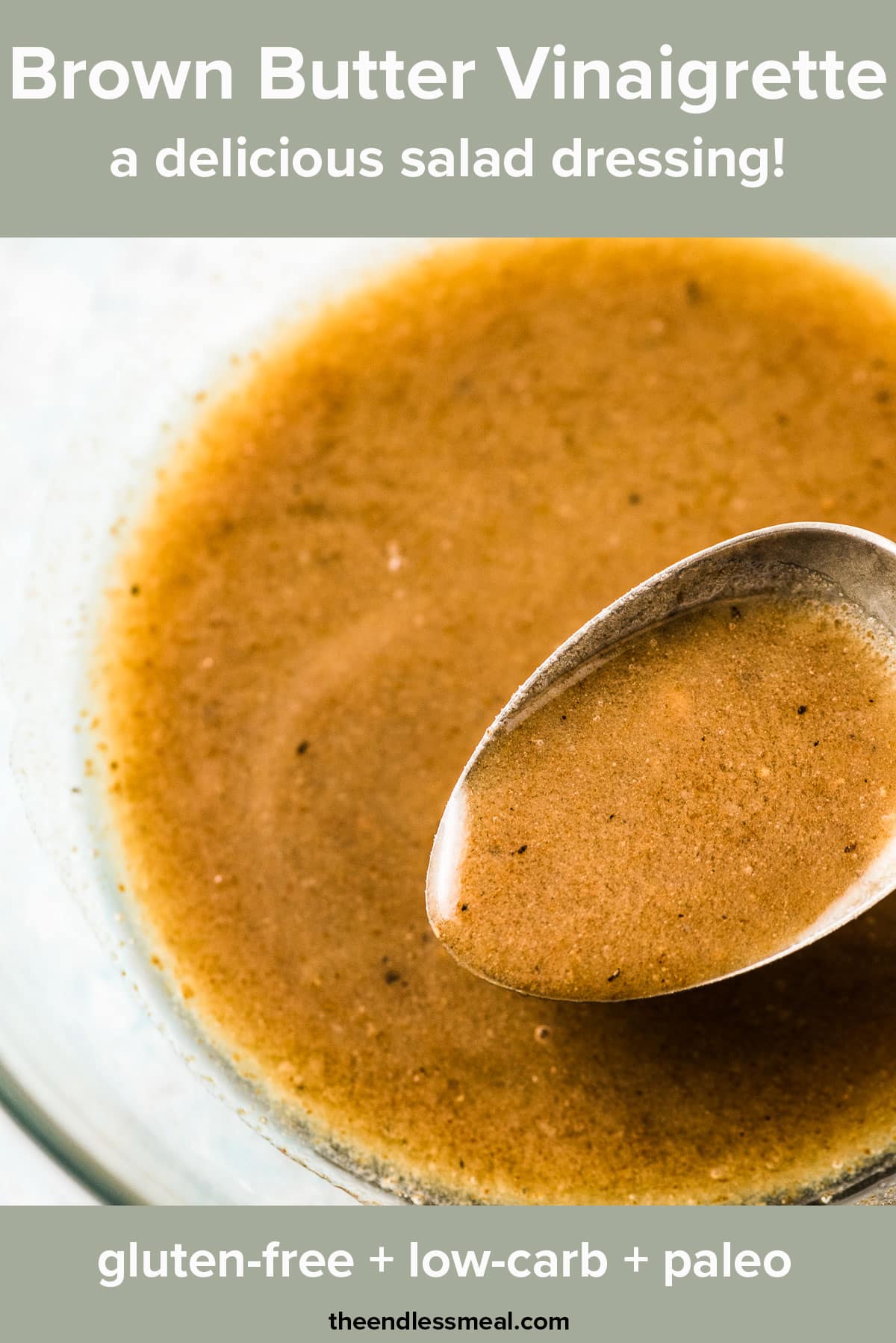 A spoon in a bowl of brown butter vinaigrette with the recipe title on top of the picture.