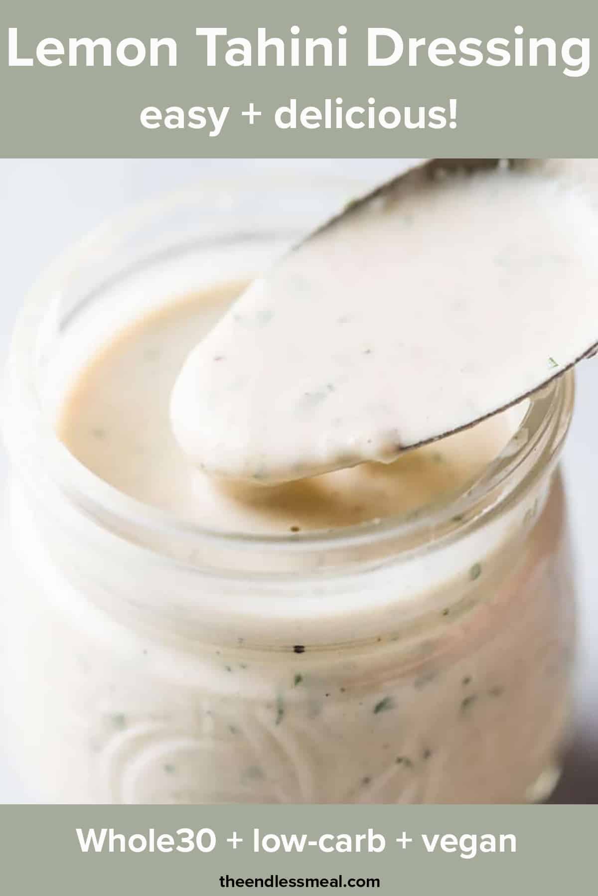 Lemon tahini dressing in a glass jar with the recipe title on top of the picture.