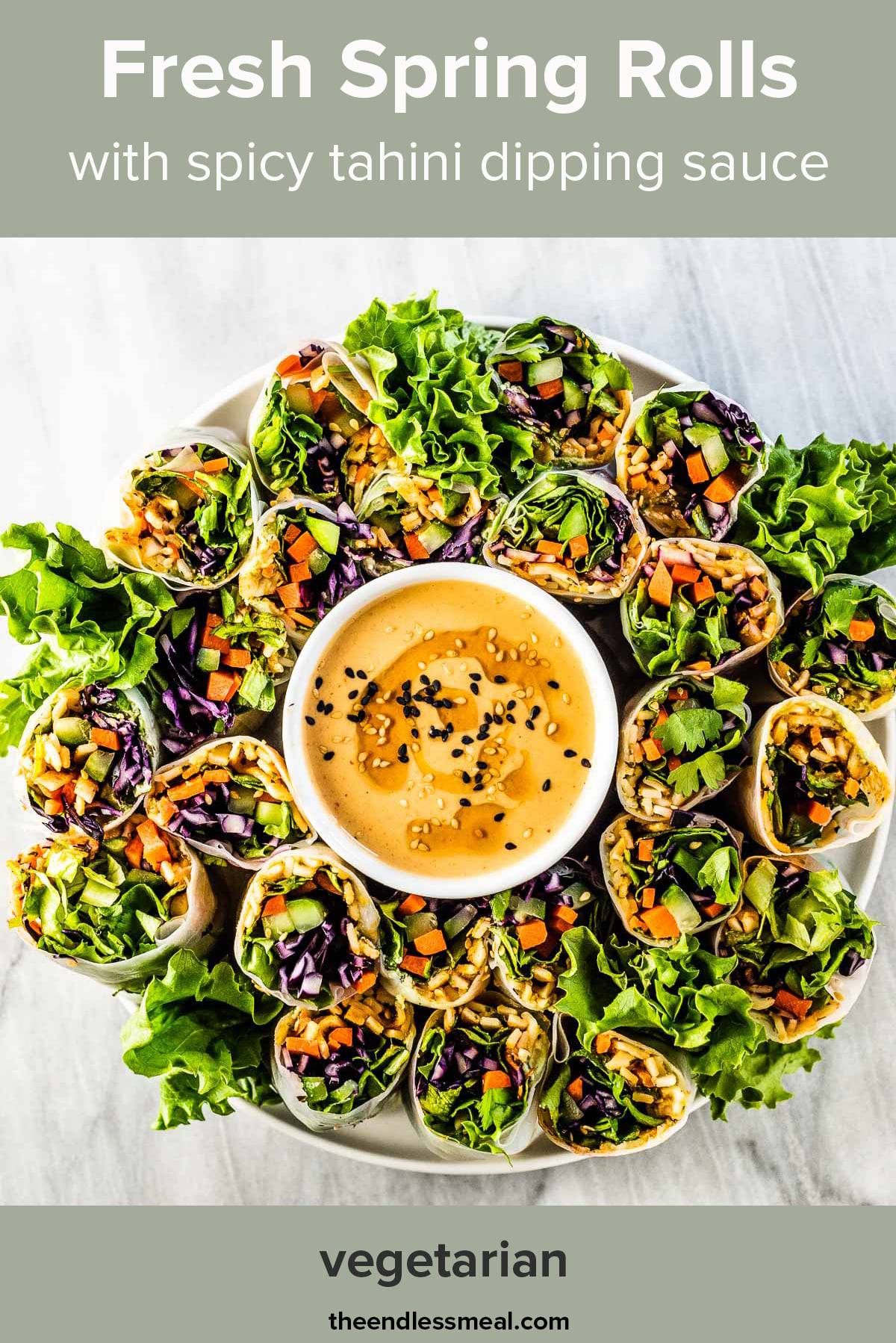 Fresh spring rolls piled on a plate around a bowl of dipping sauce like a wreath and the recipe title on top of the picture.