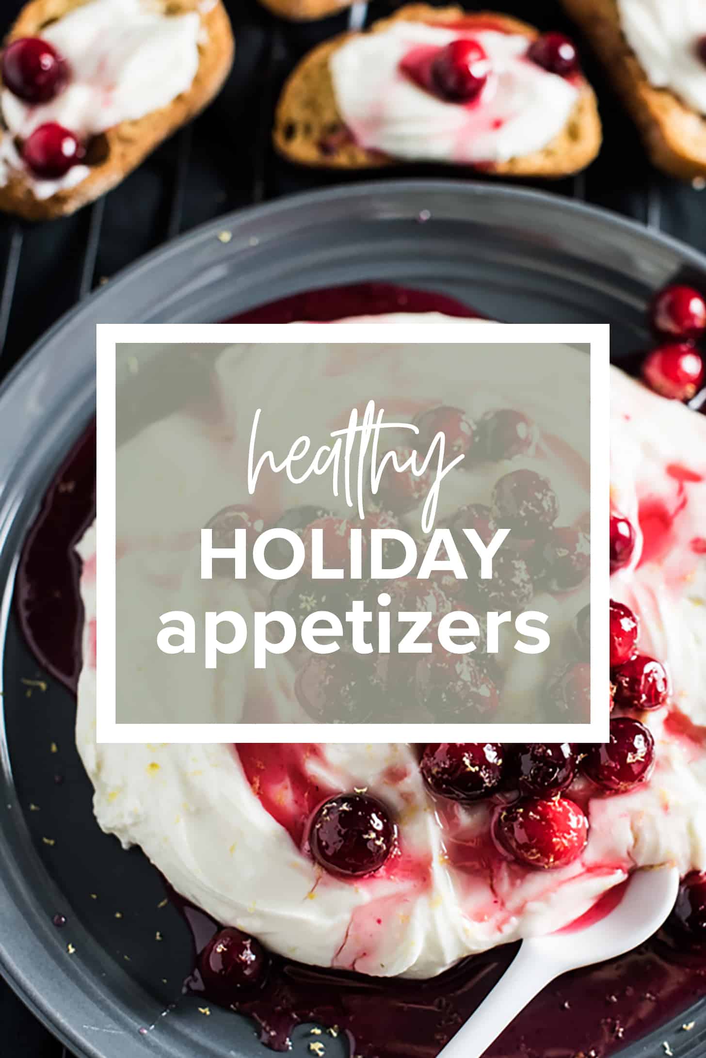 A Christmas appetizer dip on a plate with cranberries and the words Healthy Holiday Appetizers on top of the picture.