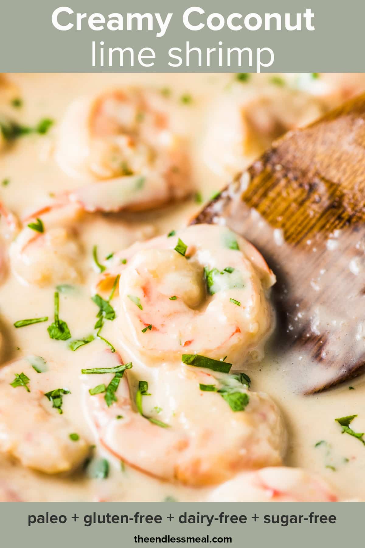 A closeup of creamy coconut lime shrimp in a pan with the recipe title on top of the picture.