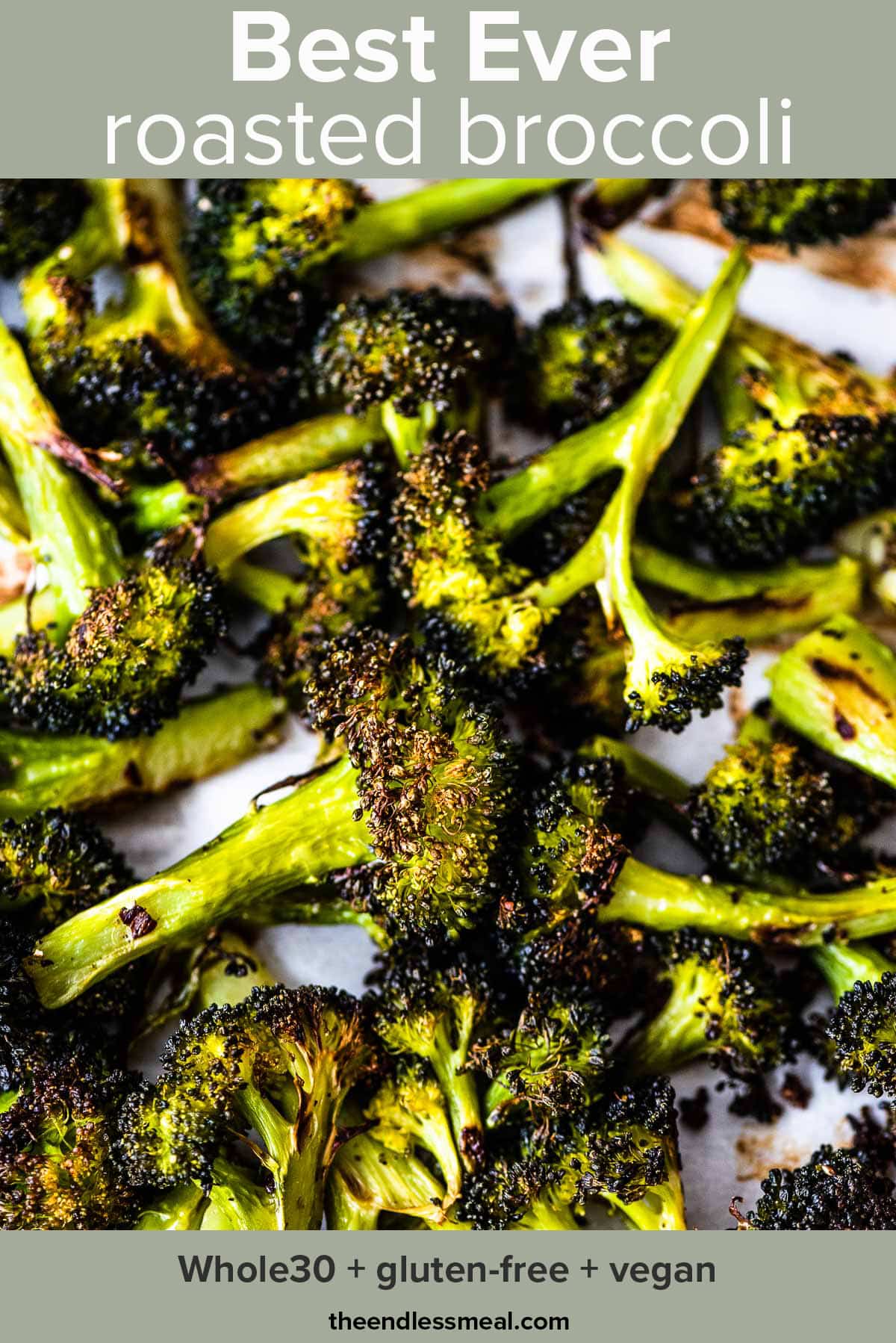 Roasted broccoli on a baking sheet and the recipe title on the picture.