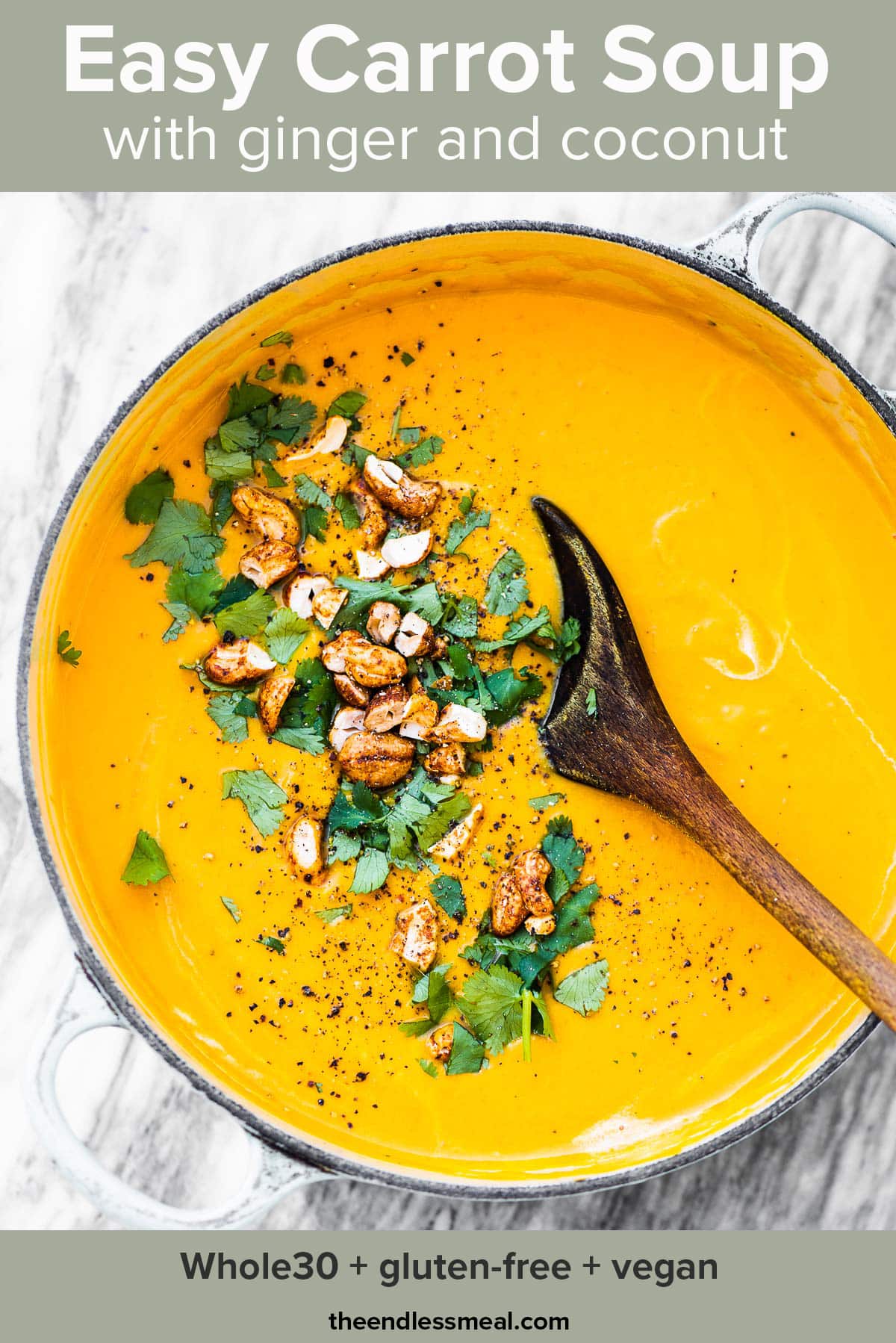 A pot of carrot soup with cashews and cilantro on top and the recipe title on top of the picture.