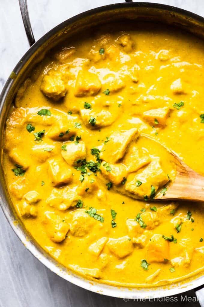 A pan of this mango chicken curry recipe.