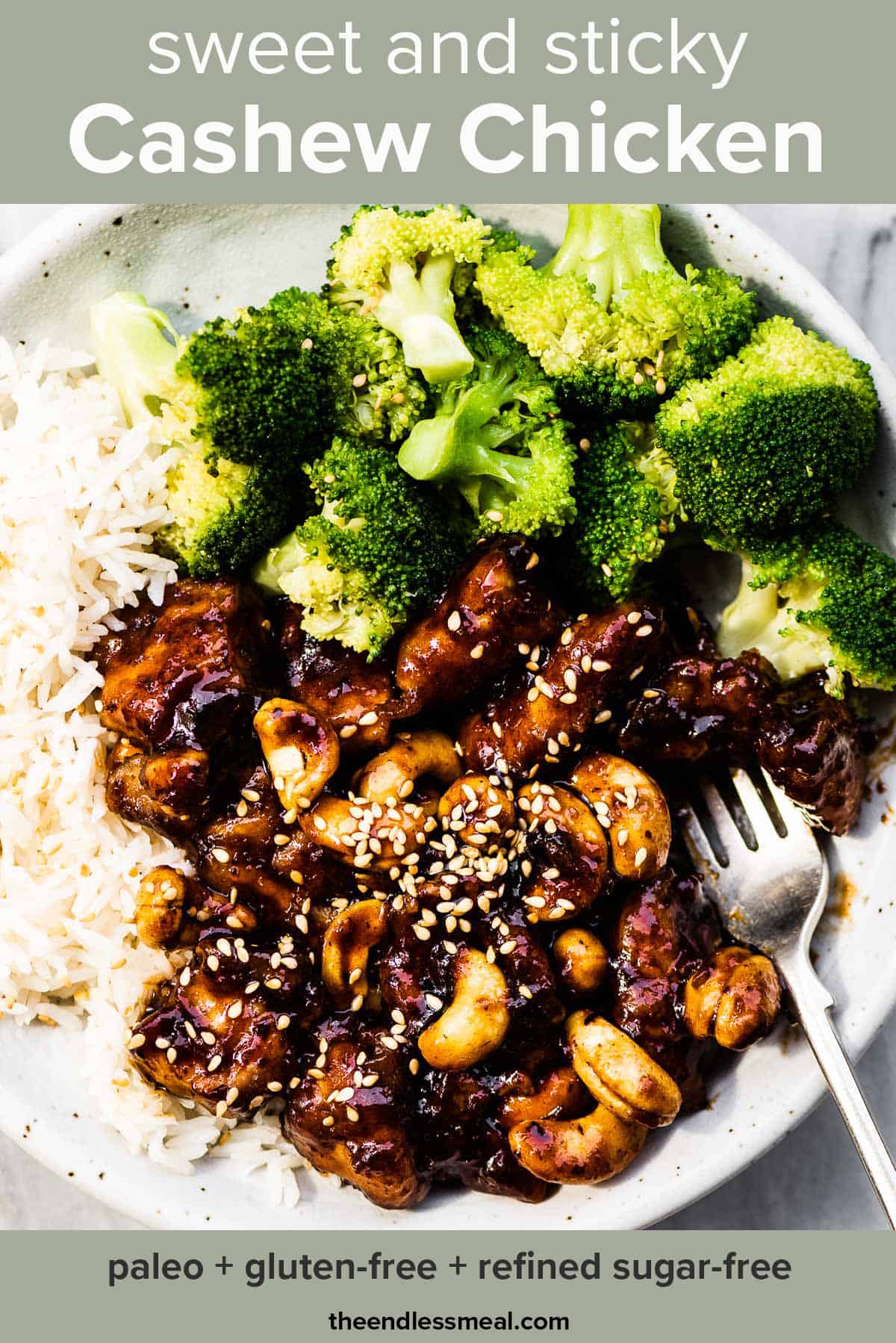 Cashew chicken on a plate with rice and steamed broccoli and the recipe title on top of the picture.