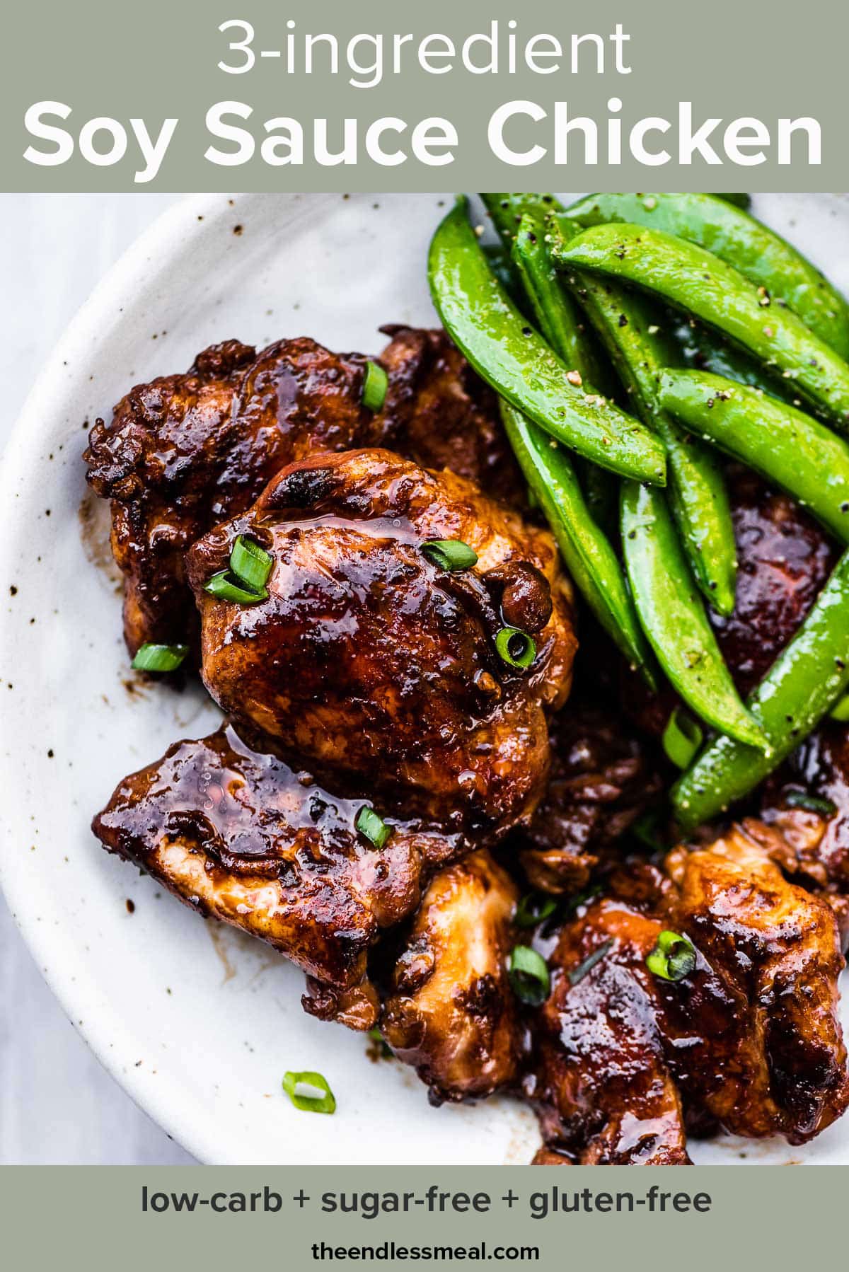 Soy sauce chicken on a white plate with snap peas and the recipe title on top of the picture.