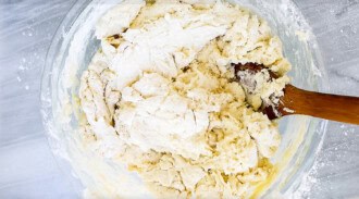 A bowl of dough ready for no yeast bread, perfect for quick and easy homemade loaves.