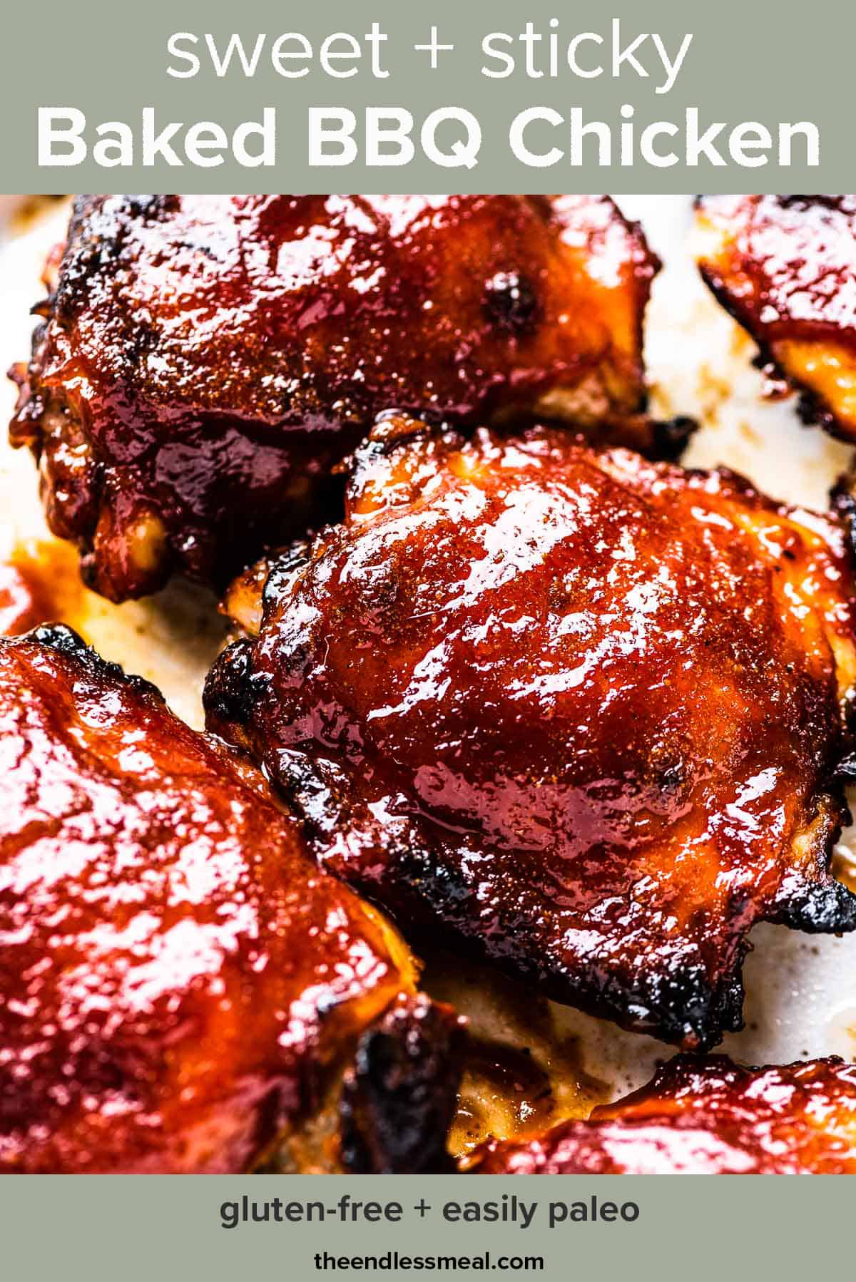 Baked BBQ chicken on a baking sheet with the recipe title on top of the picture.