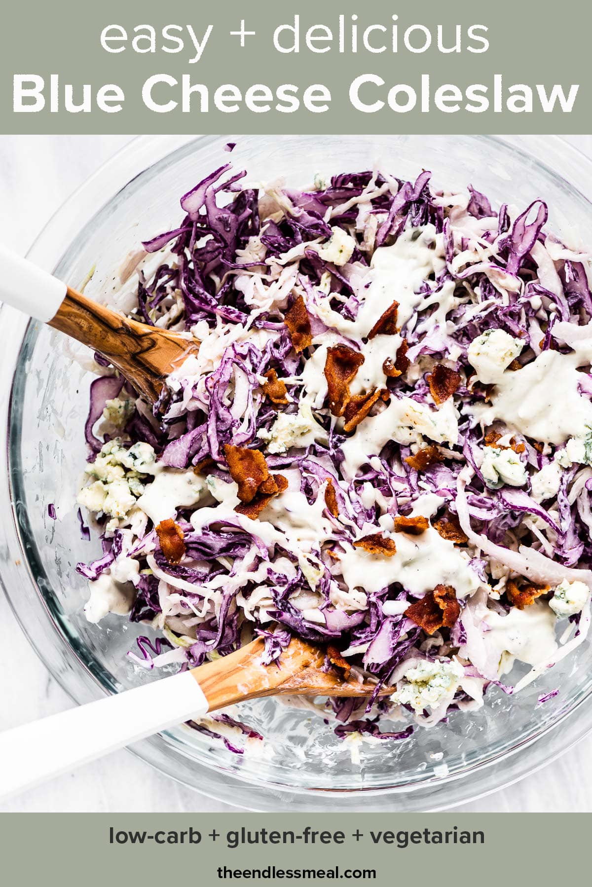 Blue Cheese Coleslaw in a glass bowl with bacon sprinkled on top.