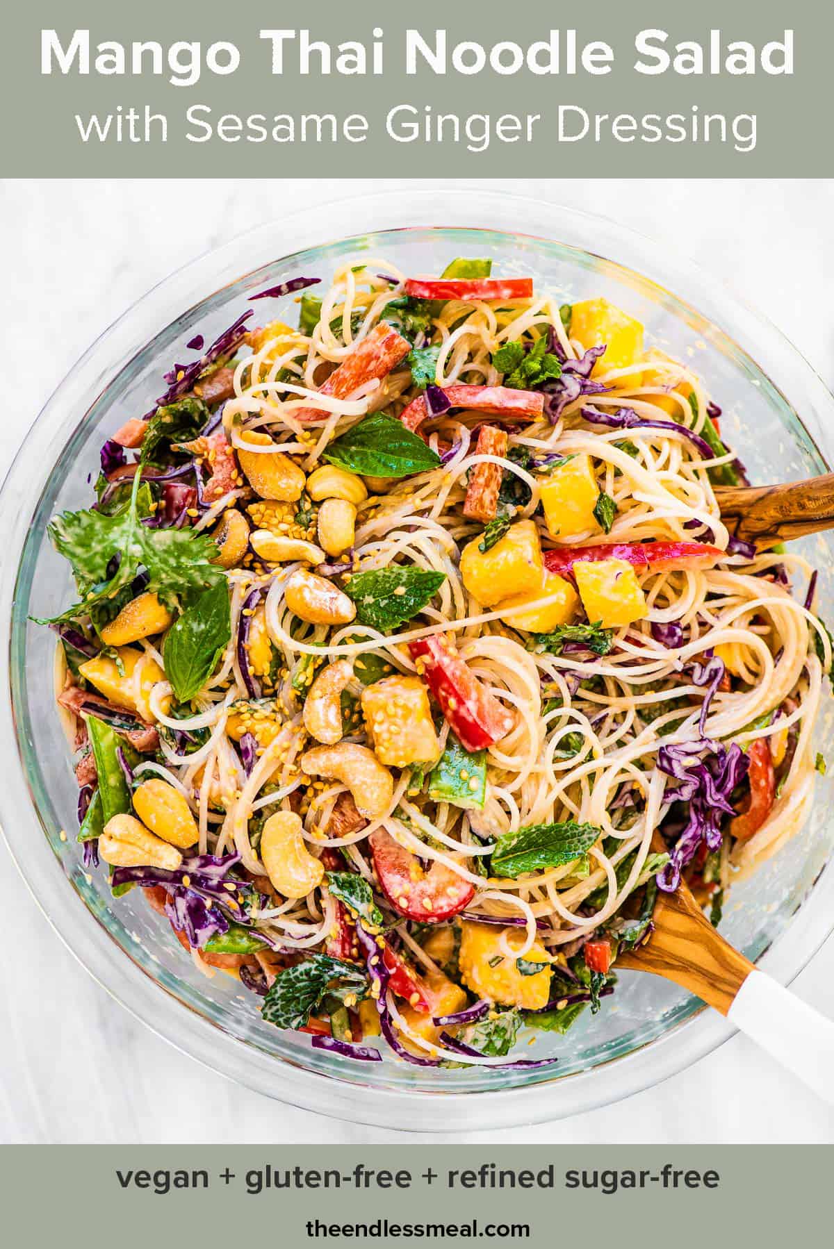 Thai noodle salad in a bowl with lots of mangos and red peppers.