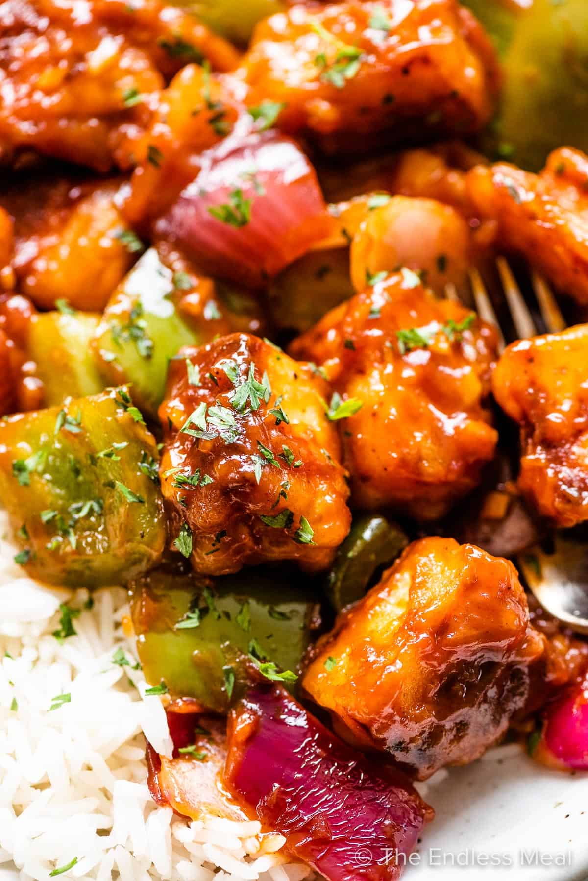 A closeup of chili paneer on a plate. 