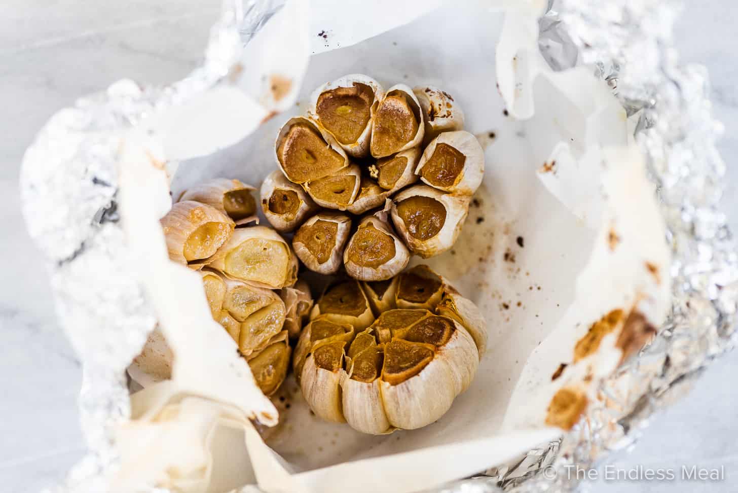 Roasted garlic in a foil package.