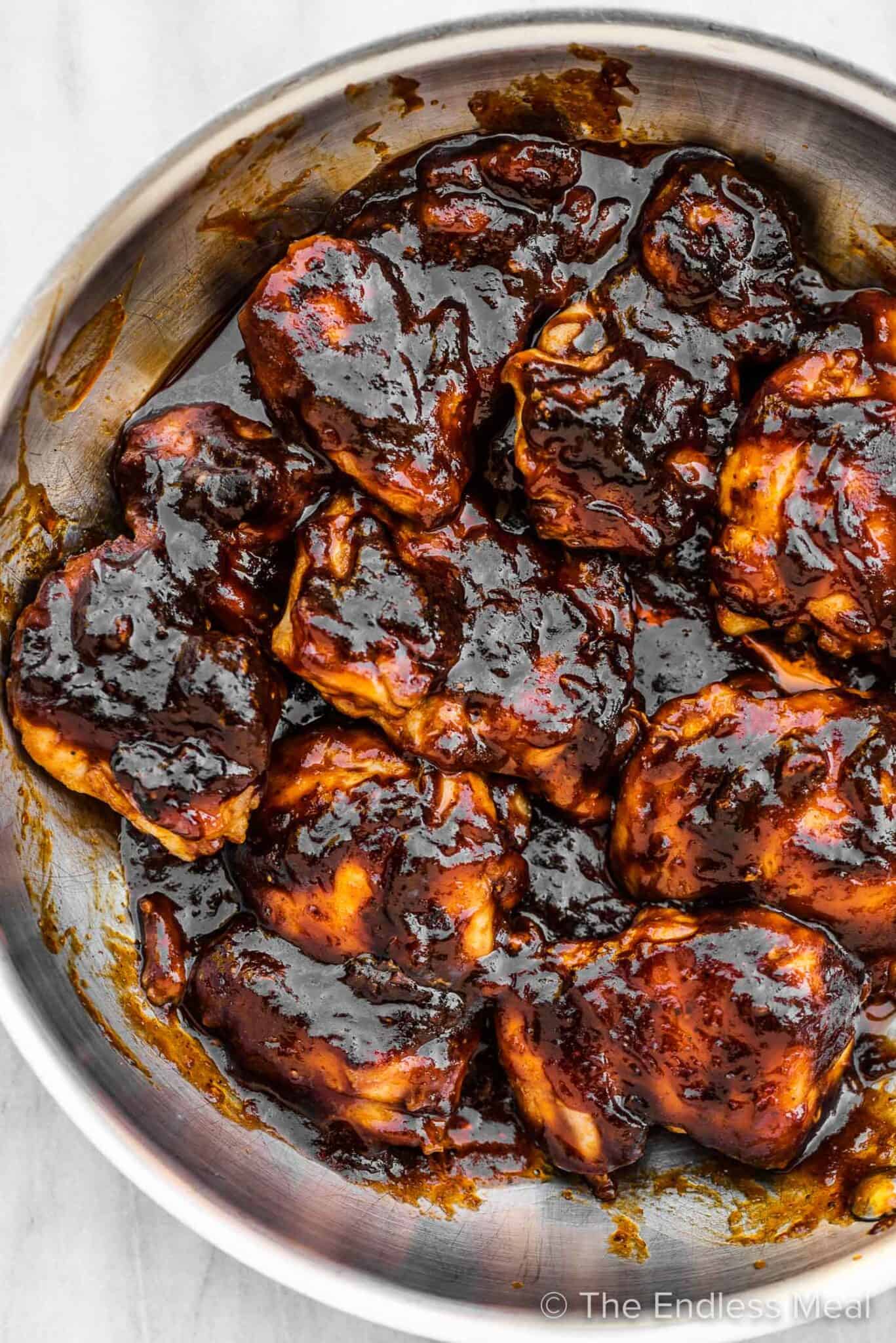 Skillet BBQ chicken in a frying pan.