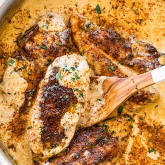 Creamy Cajun Chicken in a frying pan.