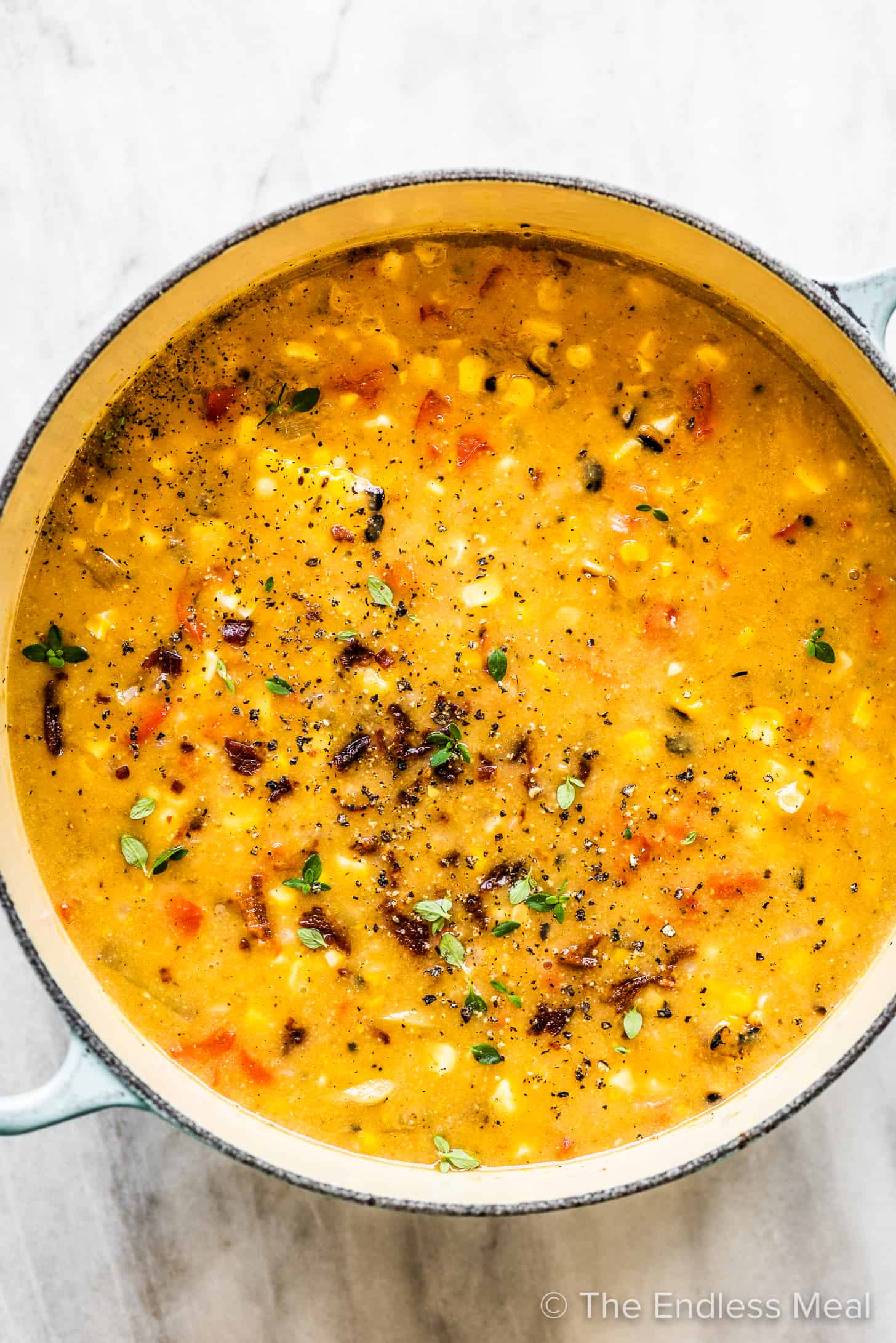 A pot of healthy grilled corn chowder.