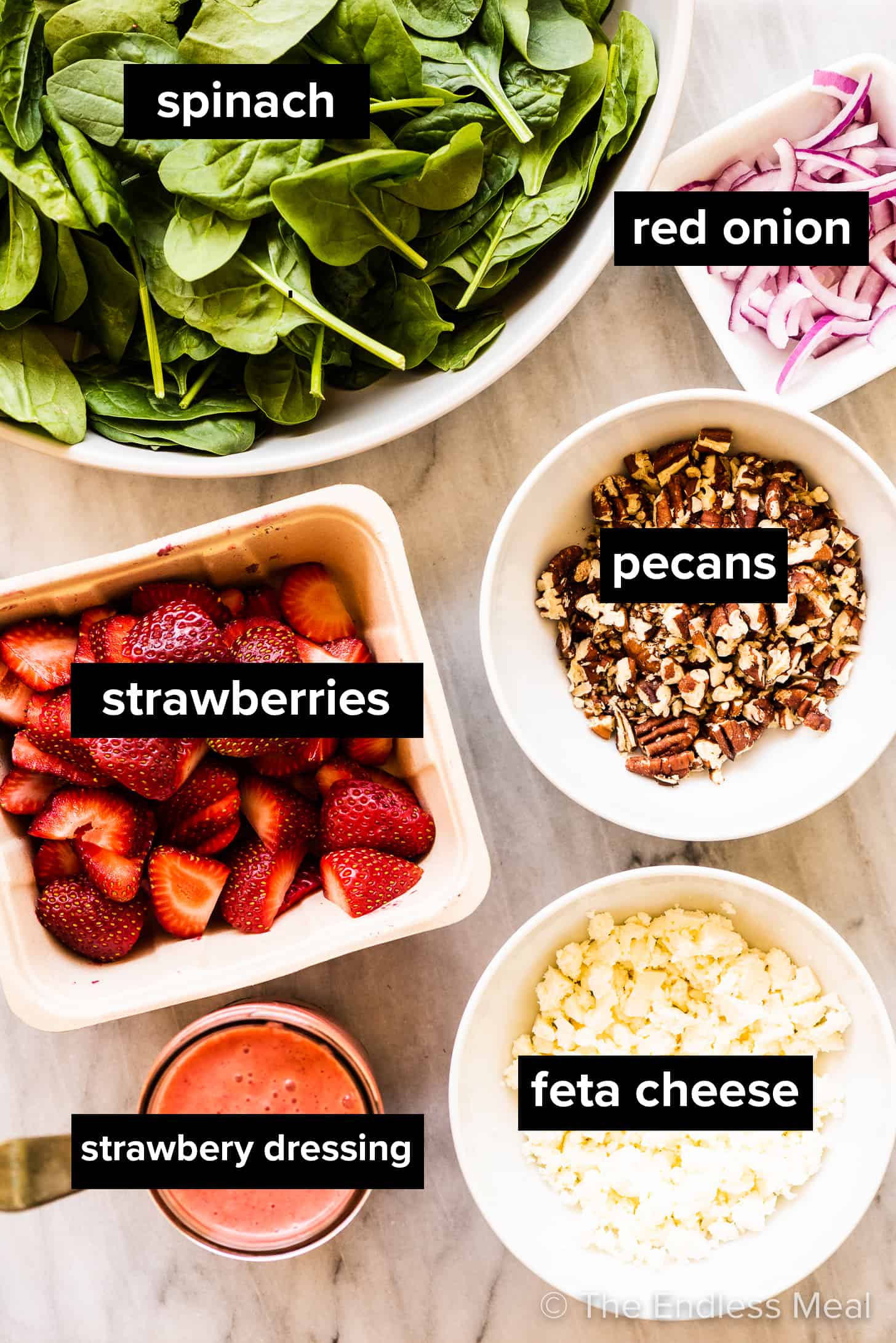 All the ingredients needed to make this spinach strawberry salad recipe.