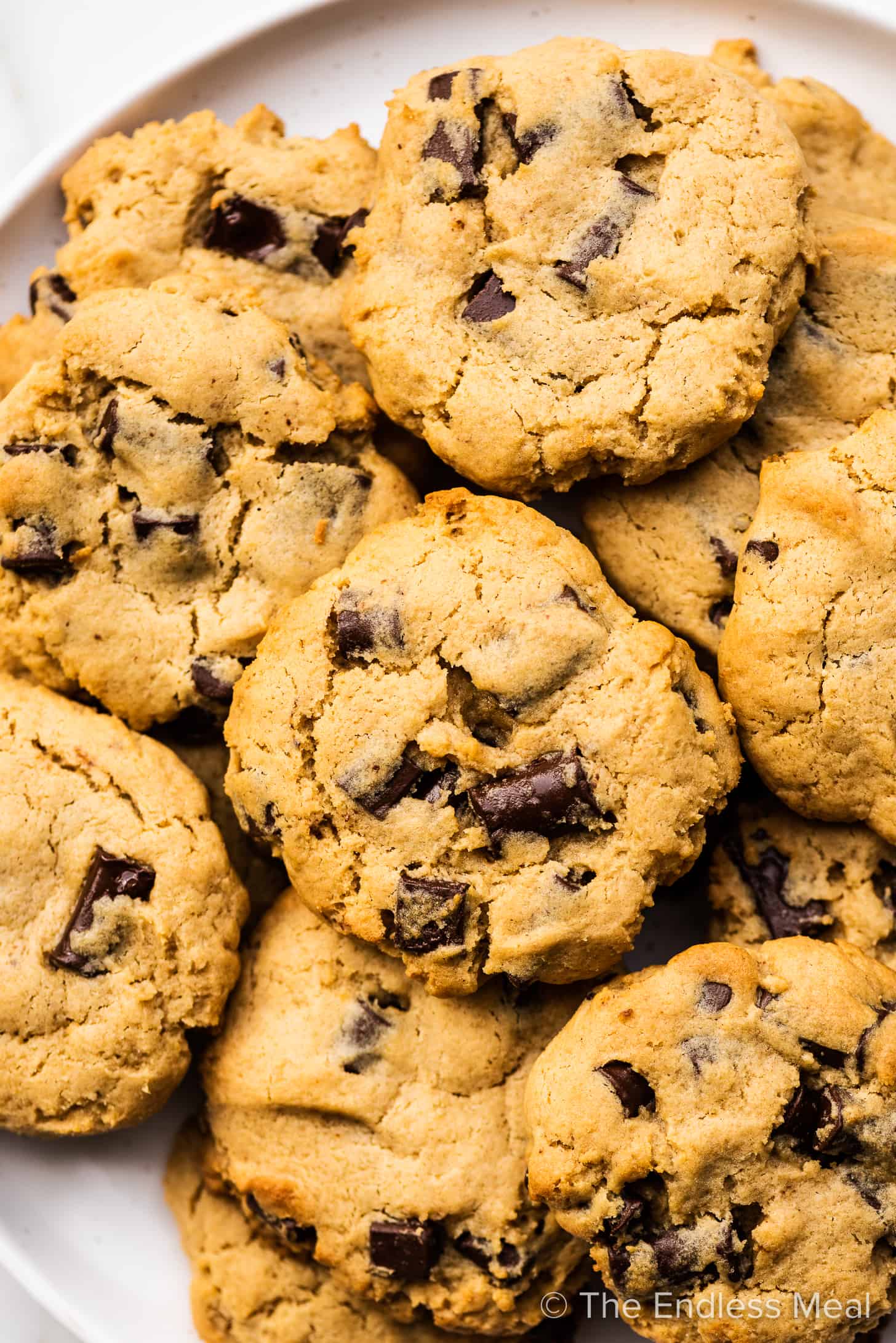 A close up of a plate of miso chocolate chip cookies.