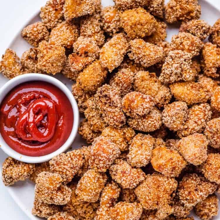 Fried Chicken Bites on a serving platter with ketchup.