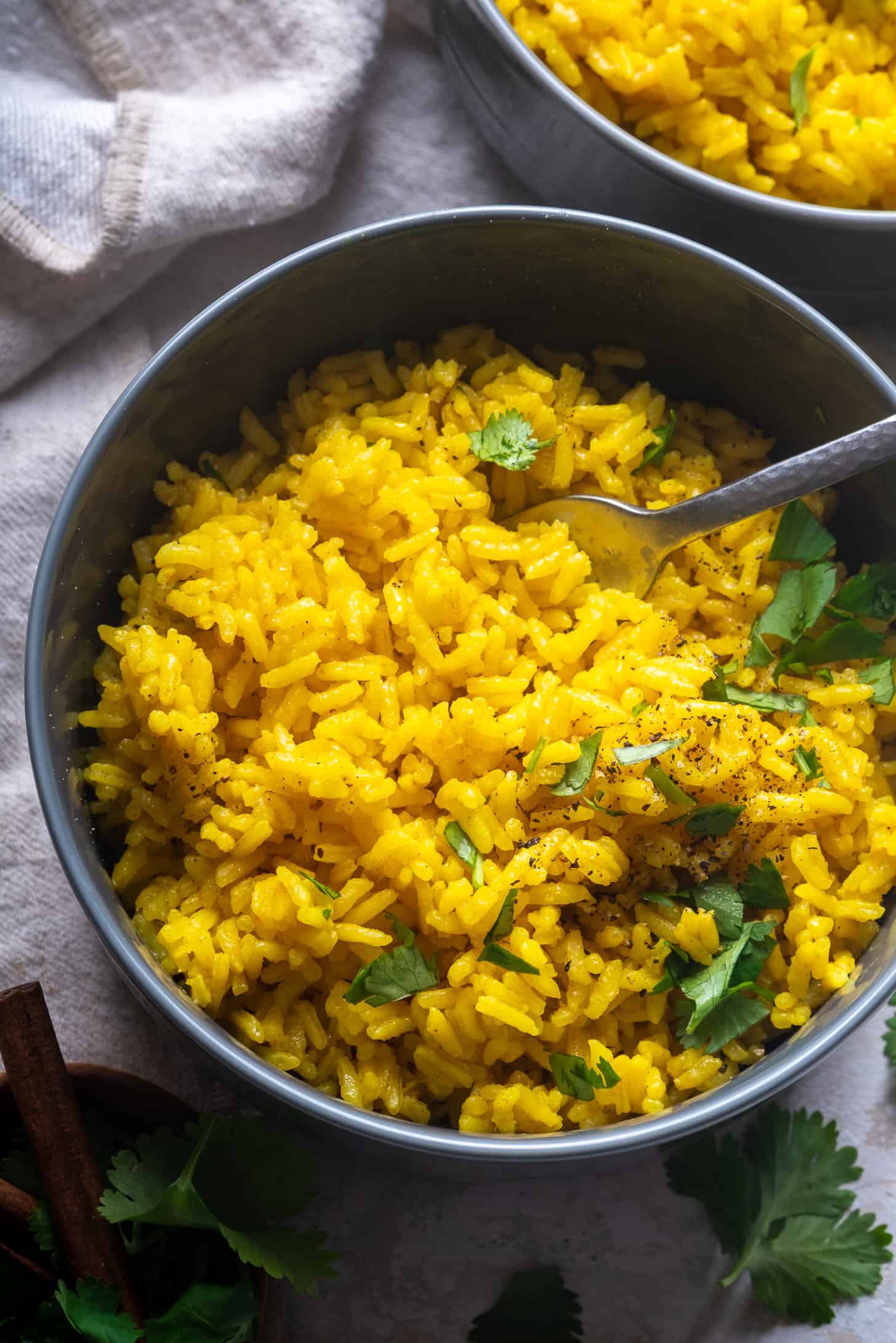 yellow turmeric rice in a bowl