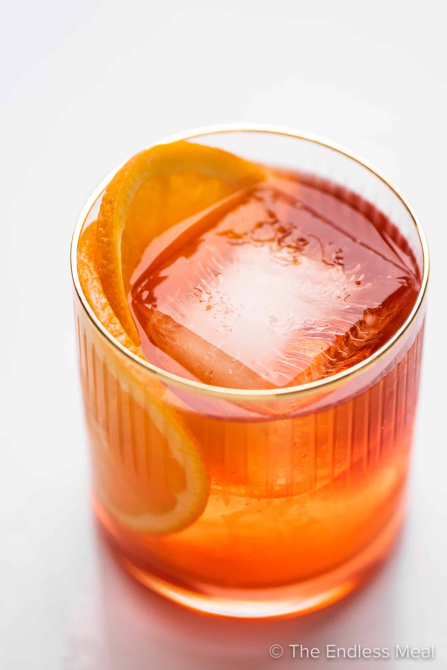 looking down on an aperol negroni in a glass