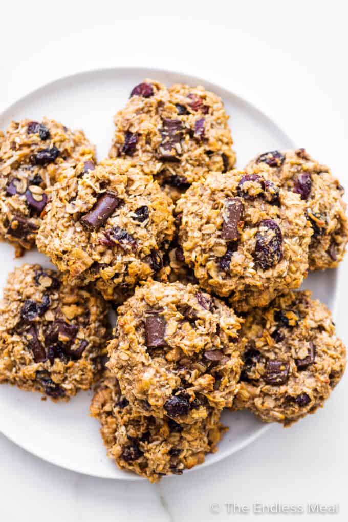 Healthy Breakfast Cookies piled on a white plate.