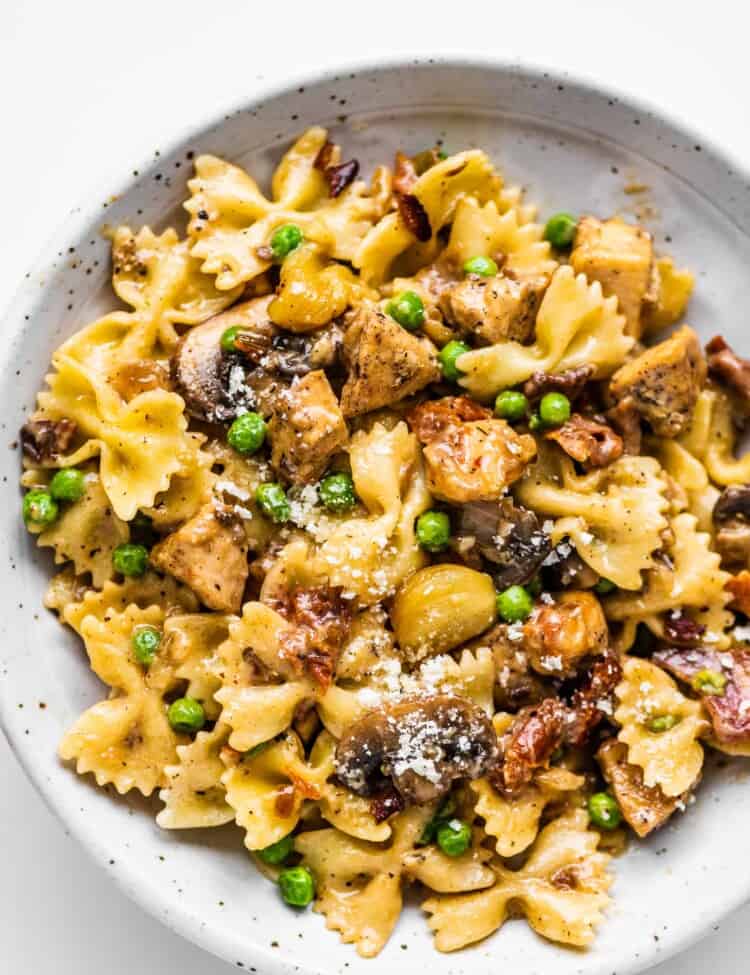 a close up of a bowl of Farfalle with Chicken and Roasted Garlic