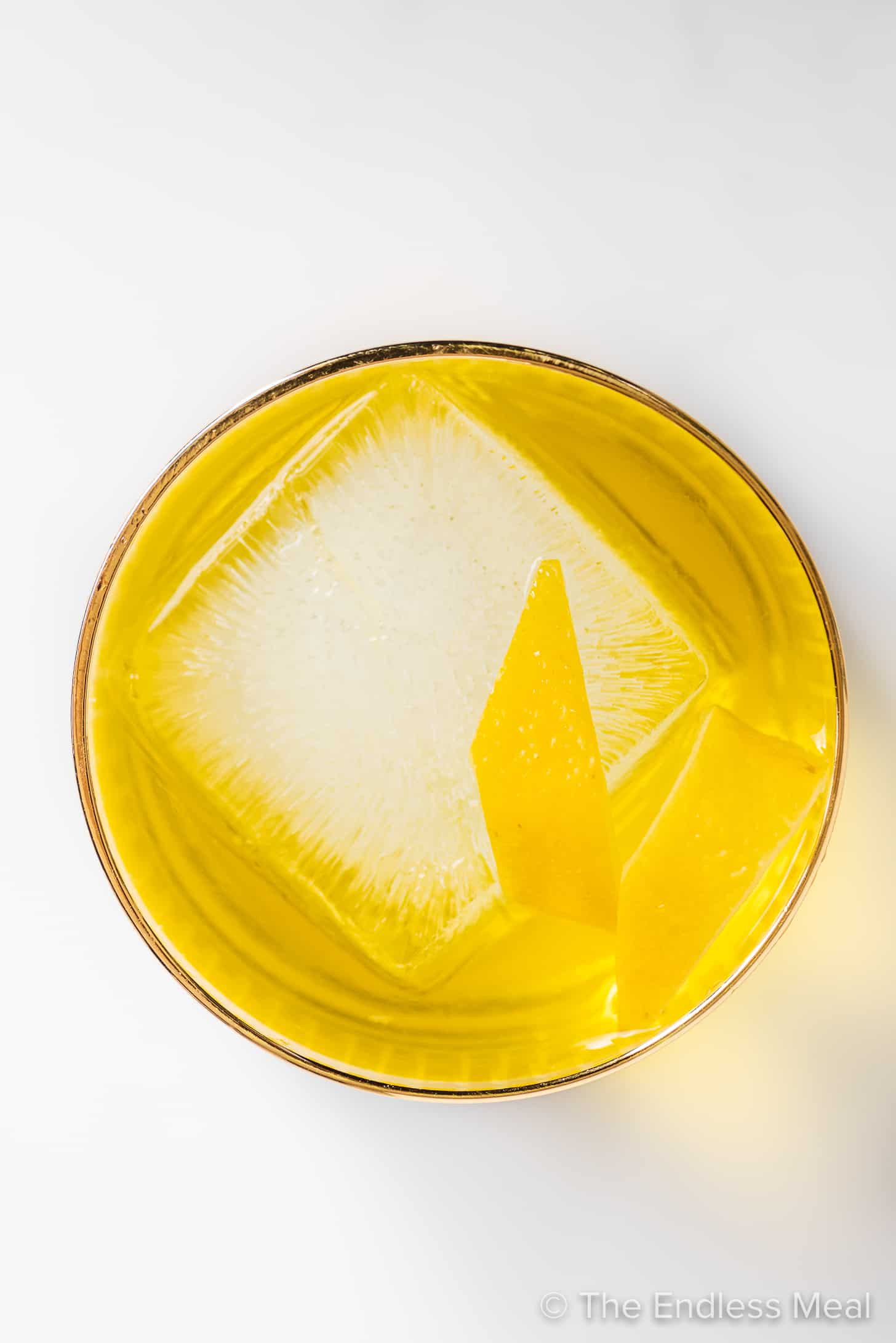 looking down on a yellow negroni cocktail