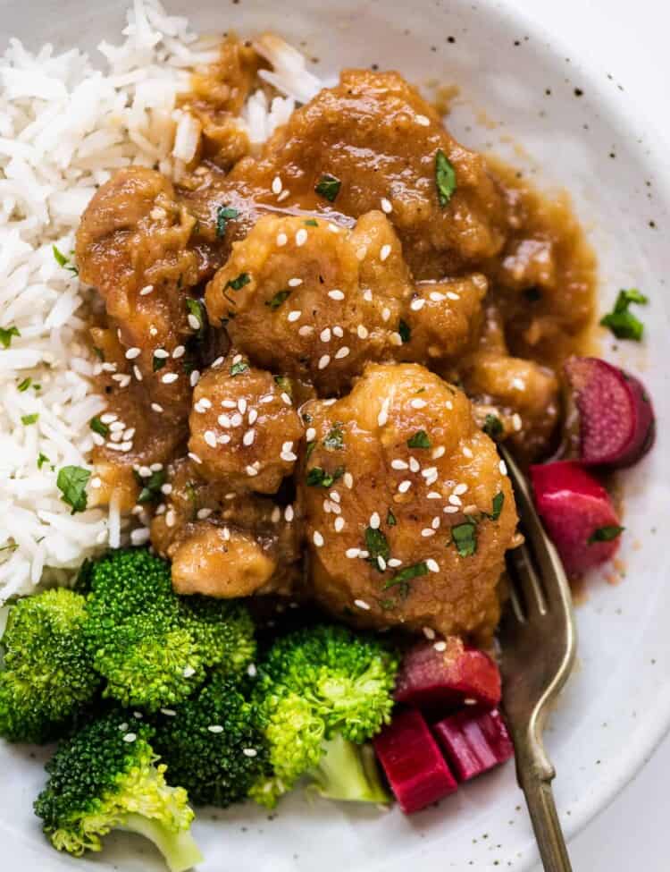 Honey Rhubarb Chicken on a plate with rice and broccoli