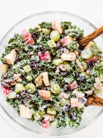 Kale Waldorf Salad in a glass salad bowl