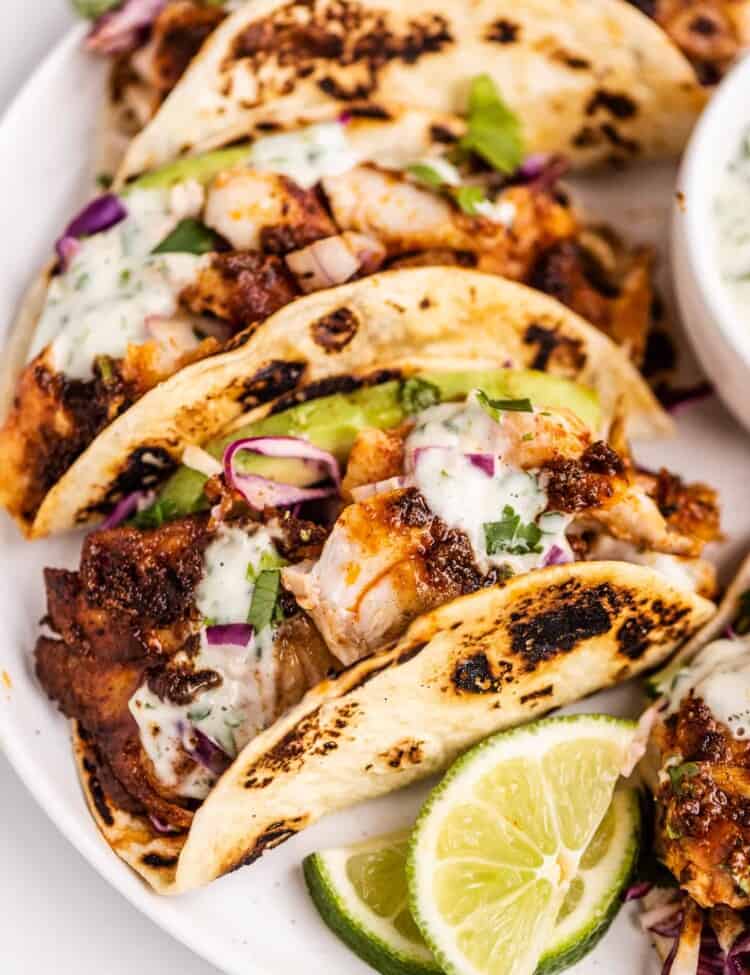 Blackened Rockfish Tacos on a plate with cilantro lime tartar sauce