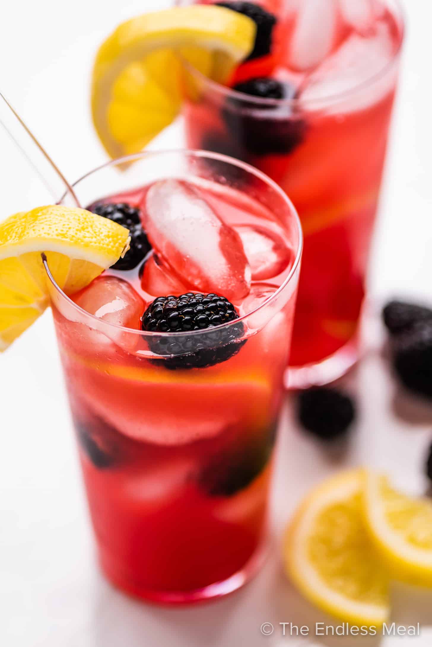 a tall glass of blackberry lemonade.