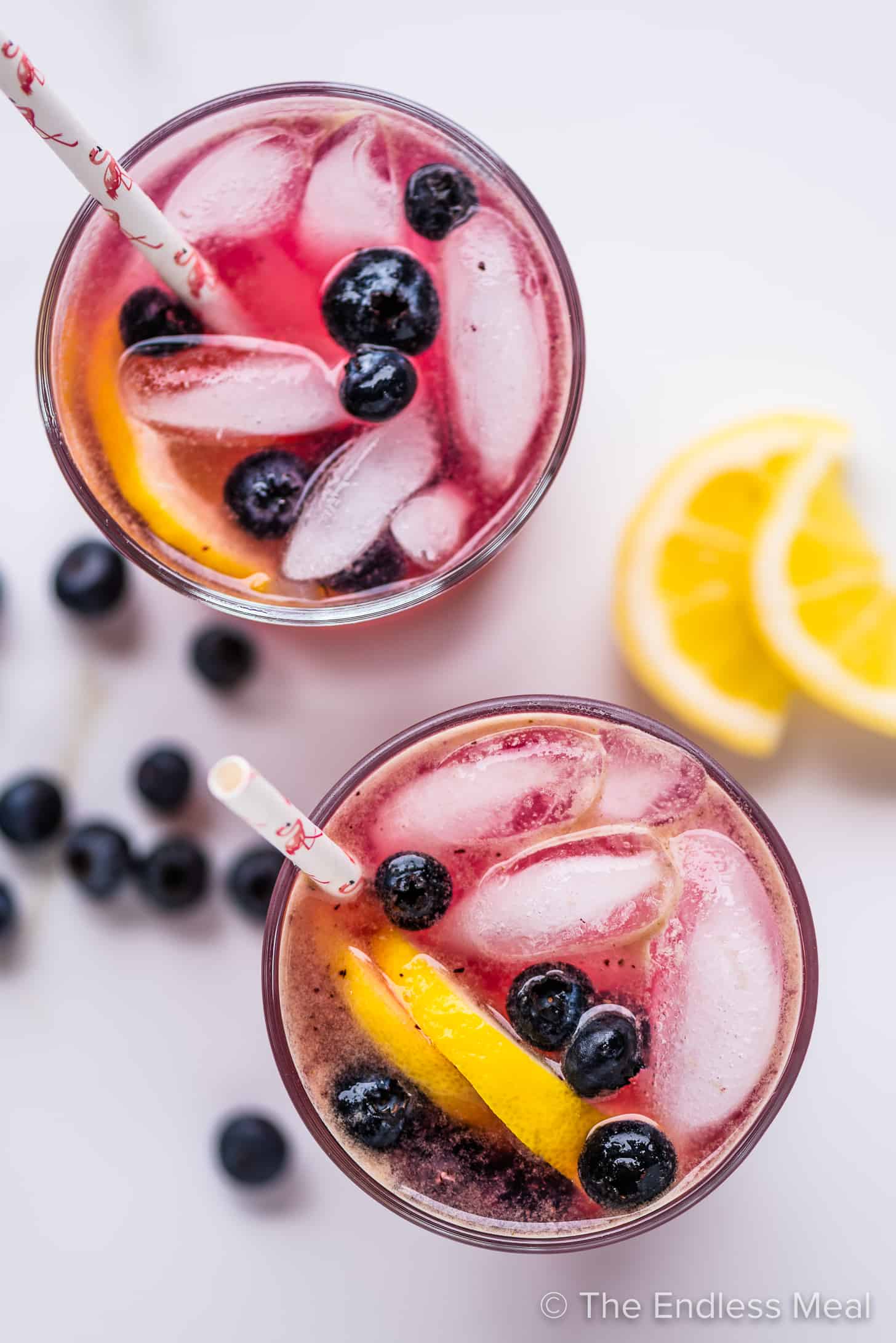 two glasses of blueberry lemonade