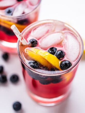 a glass of blueberry lemonade