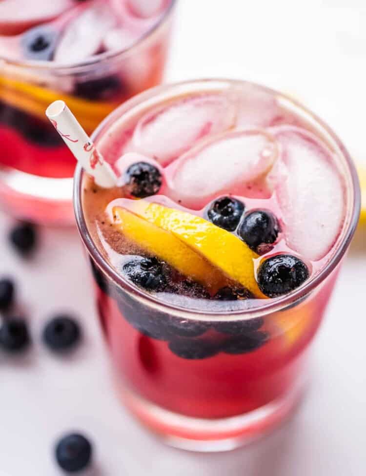 a glass of blueberry lemonade