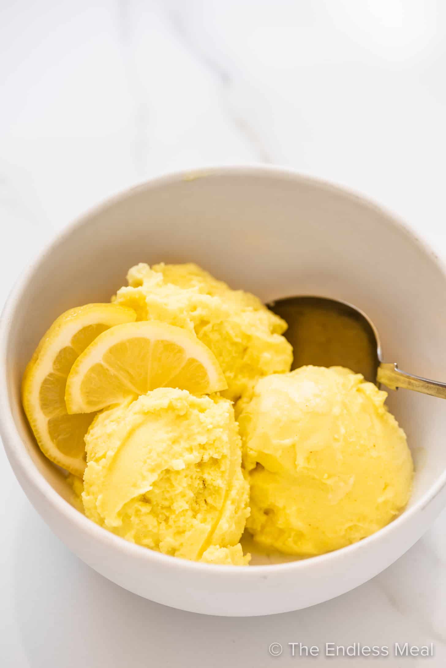 a bowl of lemon coconut ice cream