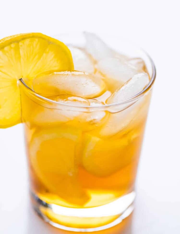 Maple Syrup Lemonade in a glass with a lemon slice