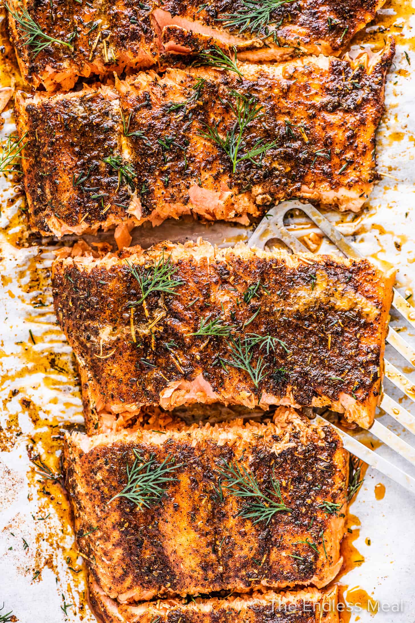 salmon baked low and slow on a baking sheet