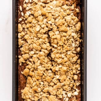 Apple Banana Bread with streusel topping in a loaf pan