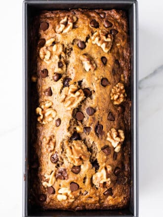 chocolate chip walnut banana bread in a loaf pan
