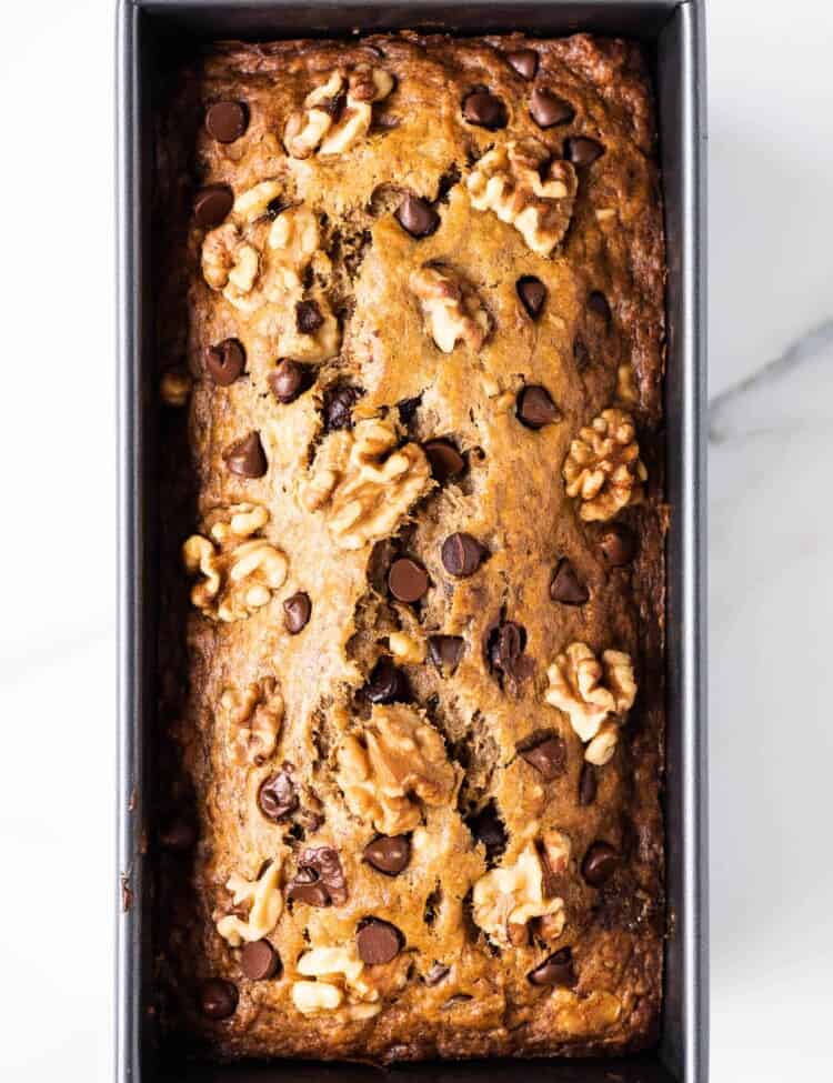 chocolate chip walnut banana bread in a loaf pan