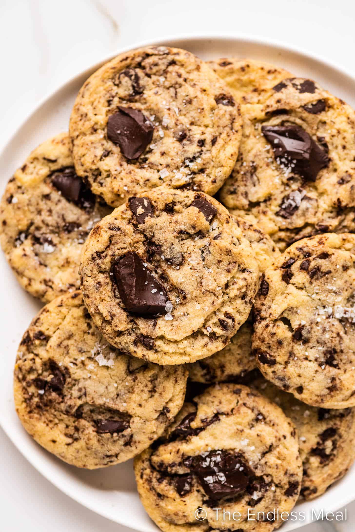 Egg-Free Chocolate Chip Cookies piled high on a plate