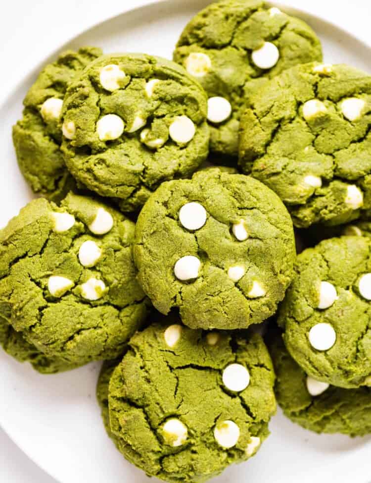 a plate piled high with green tea cookies